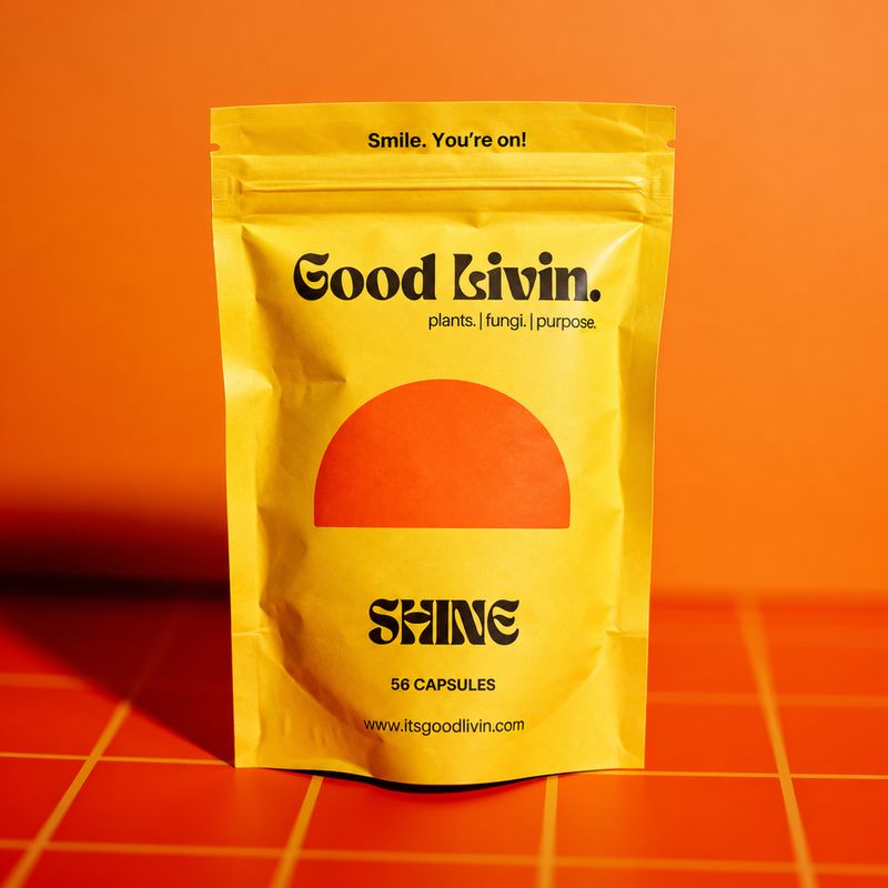 A yellow bag of Shine on an orange tiled background
